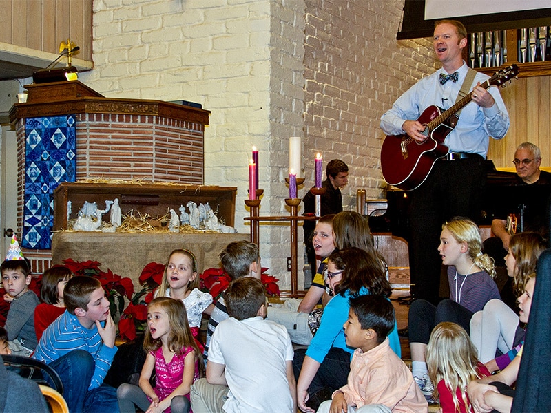 children singing worship music